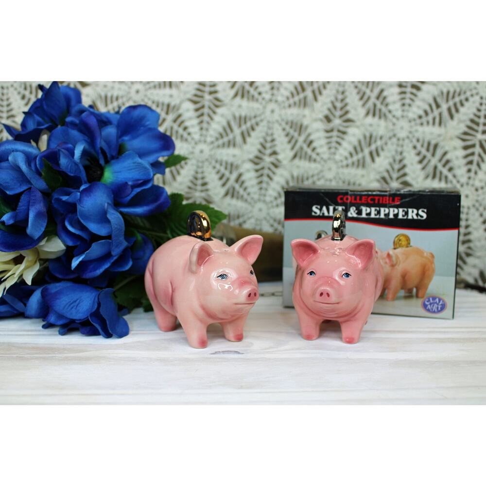 1999 Clay Art Pig Coins Salt and Pepper shakers.